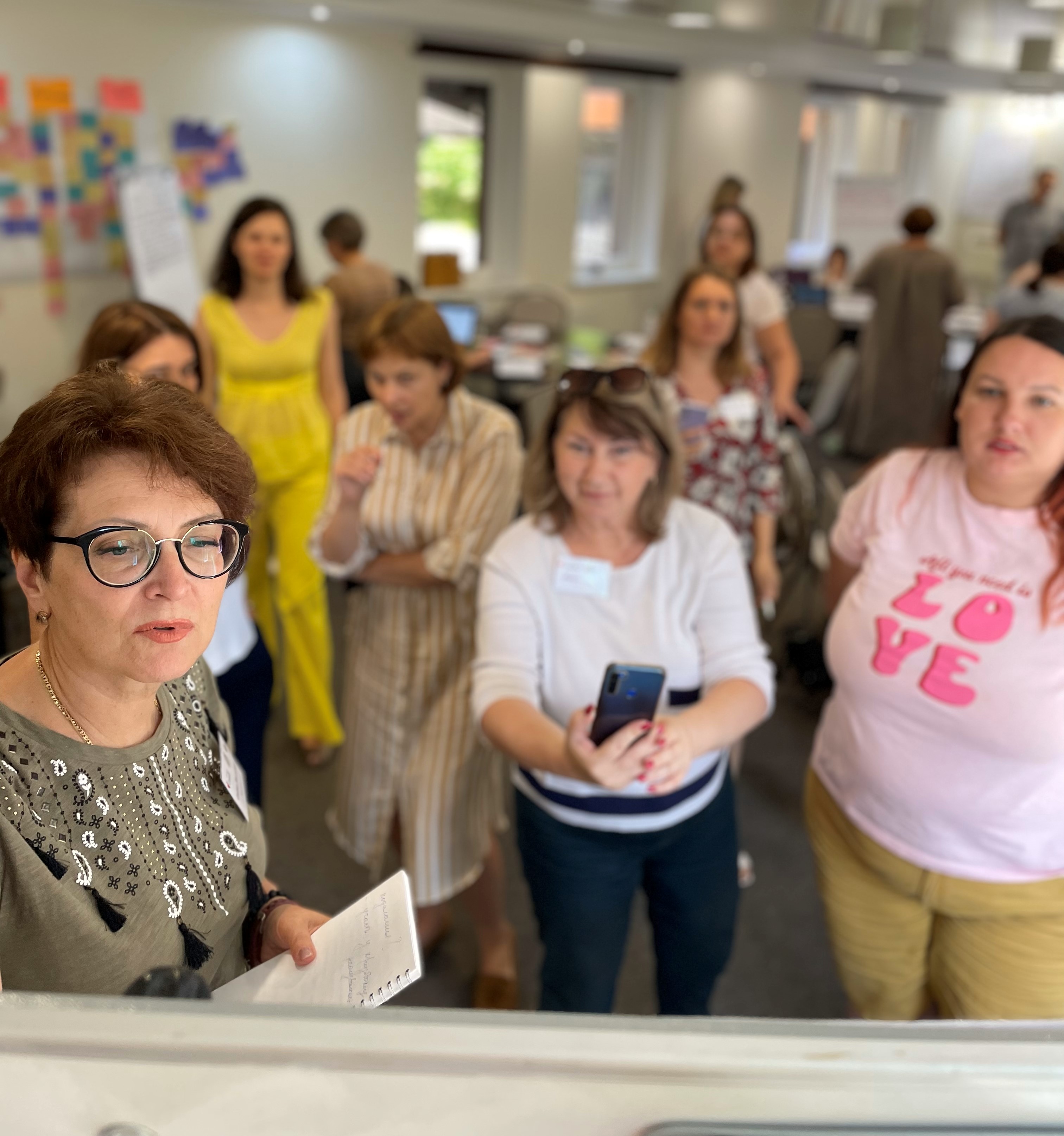 Olena Zinovenko (at left), leader of Development Center ‘Women’s World’ WRO, with other participants of the Superpower program during the workshop on Outcome Harvesting methodology in the Project Result Assessment conducted by Pact. July 2023