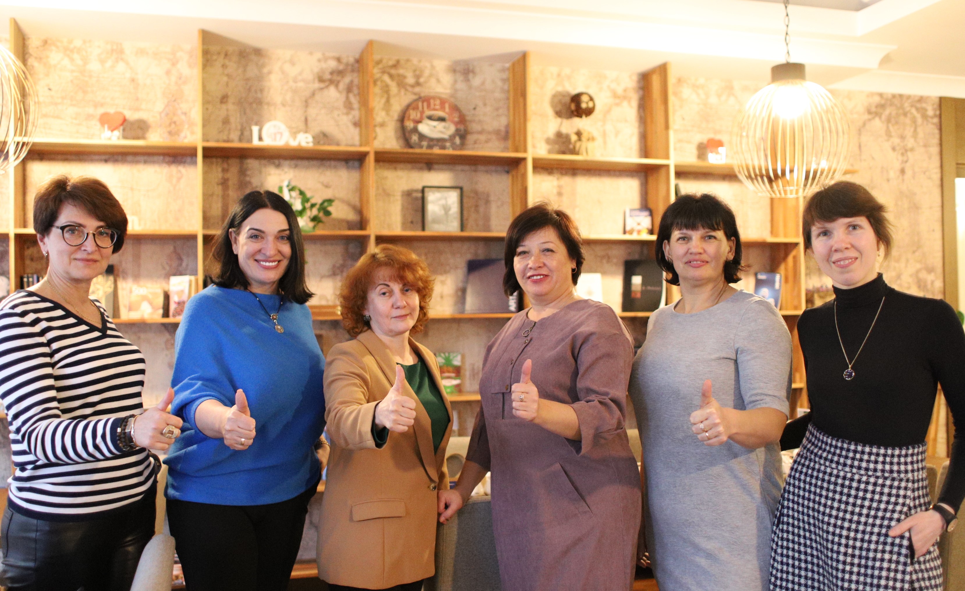 Olena Zinovenko (at left) with other participants of the Superpower program from the Eastern Cluster during the Forum Supporting Women and Girls in the War Context. March 2023.